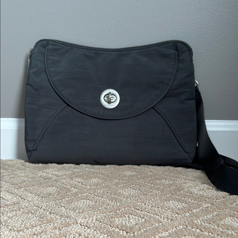 Baggallini Black Crossbody Bag with Textured Fabric and Flap Closure